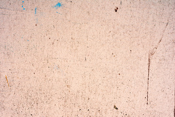 Texture of a concrete wall with cracks and scratches which can be used as a background