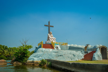 Obraz premium St. Mary Statue Island, Poovar Lake, Kerala, India