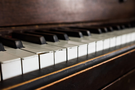 Vintage brown wood upright piano keys