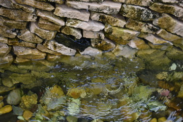 Fototapeta na wymiar Water between stones