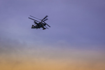 Fototapeta na wymiar Helicopter in the morning sky.