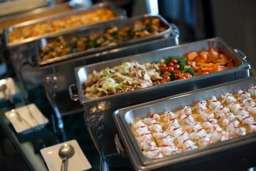 people group catering buffet food indoor, with food and beverage,Eat together.