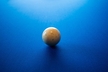 white ball snooker on blue billiard flannel table .