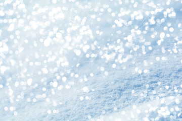 Lights on snow background. Christmas and New Year holidays celebration concept.
