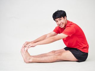 Young man sports player stretching and exercising