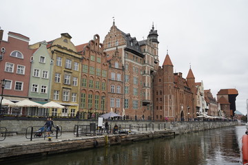 Fototapeta na wymiar Gdansk, Poland - September 2019: view of the central promenade. Urban architecture on the waterfront.