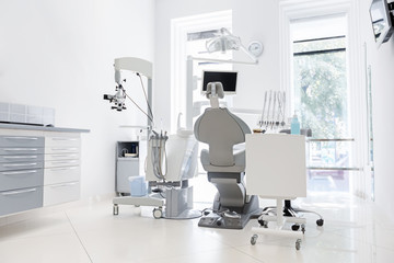 Interior of new white modern dental clinic office