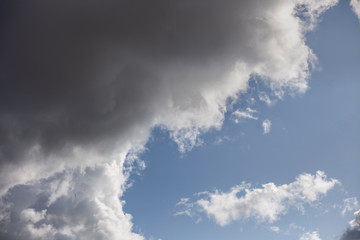 Clouds in the sky. Autumn weather. Beautiful landscape with gray clouds.