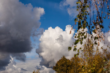Clouds in the sky. Autumn weather. Beautiful landscape with gray clouds.
