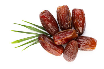 Dry dates isolated on white background. Top view. Flat lay pattern.
