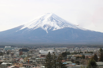 Beautiful landscape Mt.Fuji in winter season in the morning, Fujiyoshida, Yamanashi, Japan. The scenery of the Mt.Fuji with city. Travel concept