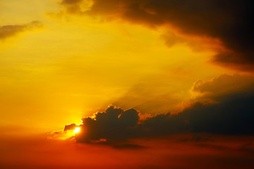Naklejka na ściany i meble sunset on sky back dark silhouette evening cloud red background