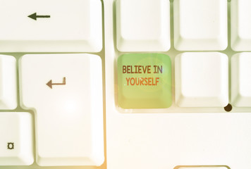 Word writing text Believe In Yourself. Business photo showcasing common piece of advice that you can do everything White pc keyboard with empty note paper above white background key copy space