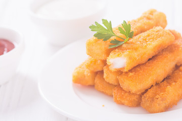 Fried fish sticks ( fingers ) or chicken nugget