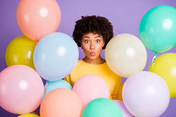 Fototapeta na wymiar Close-up portrait of her she nice attractive lovely lovable girlish funky funny cheerful wavy-haired girl sending kiss among air balls isolated over violet purple lilac pastel color background