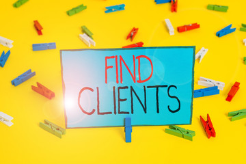 Text sign showing Find Clients. Business photo showcasing to identify or looking for a potential customers or leads Colored clothespin papers empty reminder yellow floor background office