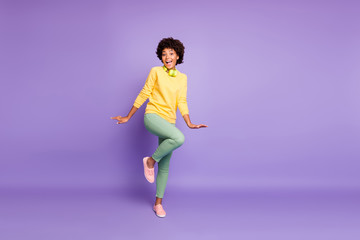 Fototapeta na wymiar Full length body size view of her she nice attractive charming lovely funny funky girlish cheerful cheery wavy-haired girl dancing having fun isolated over violet purple lilac pastel color background