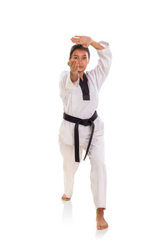 Female taekwondo athlete with thrusting hand strike stance