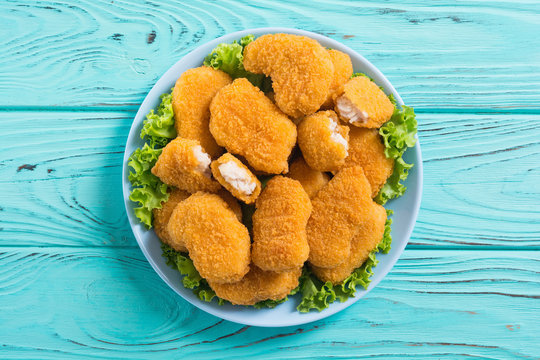 Chicken Nuggets In Plate On Rustic Background