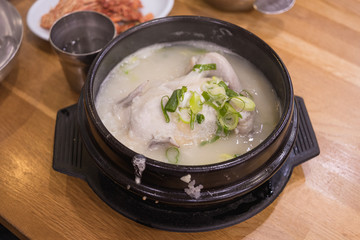 Traditional samgyetang, chicken soup with ginseng, Korean food.