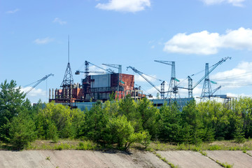 Chernobyl sarcophagus over the 4th reactor, Ukraine. Chernobyl nuclear power plant.