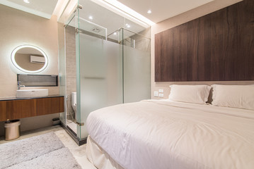 Fototapeta na wymiar Small contemporary open-plan bathroom hotel room design.