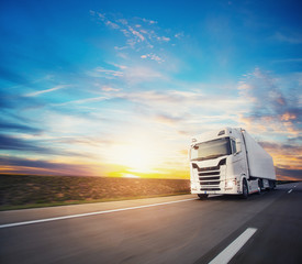 European truck vehicle with dramatic sunset light © Jag_cz