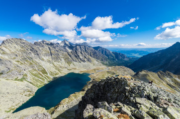 High Tatras ridges in Poland and Slovakia. Velke Hincovo pleso and Vysoke Tatry mountain range, view from Koprovsky Peak