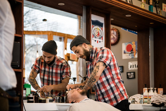 Barber washing man?s hair