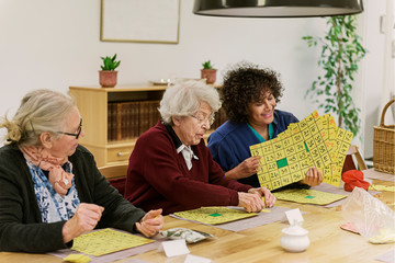 Senior women playing bingo