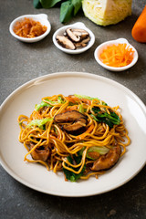 yakisoba noodles stir-fried with vegetable in asian style - vegan and vegetarian food