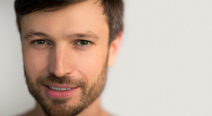 Fototapeta premium Middle-Aged Man Smiling At Camera Posing In Studio, Panorama