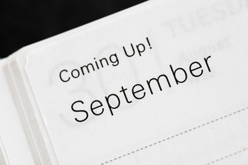 Obraz premium Coming Up! September, months of a year. Macro shot of a monthly planner.