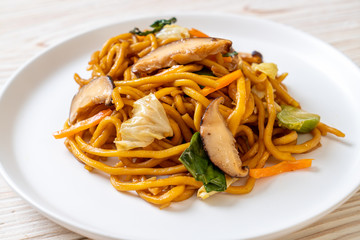 yakisoba noodles stir-fried with vegetable in asian style - vegan and vegetarian food