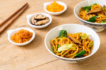 yakisoba noodles stir-fried with vegetable in asian style - vegan and vegetarian food