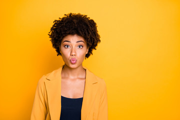 Close-up portrait of her she nice attractive lovely charming pretty wavy-haired girl sending you kiss isolated over bright vivid shine vibrant yellow color background