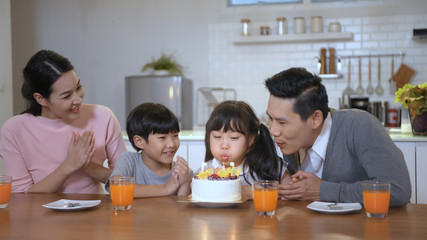 Family concept. Parents are celebrating birthdays for their children. 4k Resolution.