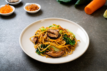 yakisoba noodles stir-fried with vegetable in asian style - vegan and vegetarian food