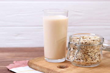 oatmeal milk on the table. Vegetable Milk, Vegetarian Milk.