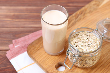 oatmeal milk on the table. Vegetable Milk, Vegetarian Milk.