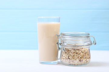 oatmeal milk on the table. Vegetable Milk, Vegetarian Milk.
