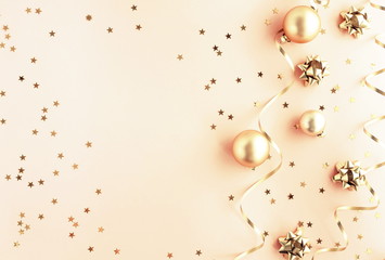Christmas background. Xmas or new year gold color decorations on pink background with empty copy space for text.  holiday and celebration concept for postcard or invitation. top view 