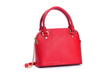 Fashionable red female hand bag on white background