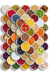 Fruits and vegetables spices ingredients cooking bowls berries portrait format food from above
