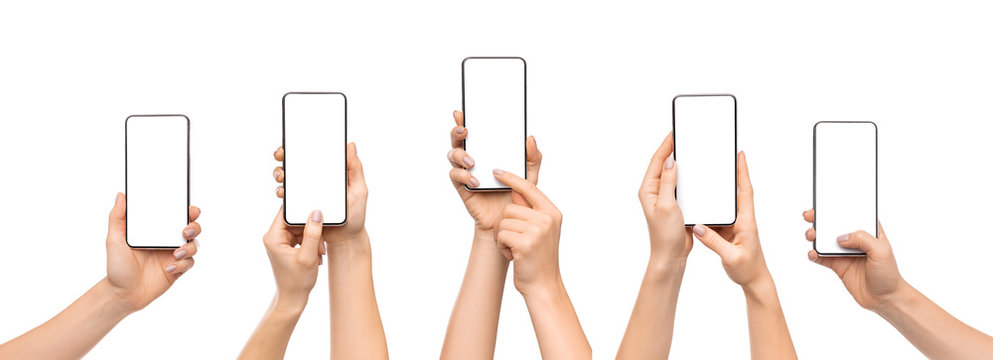 Woman's hands using smartphone with blank screen over white background