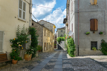 Colorful alley in an italian village during summer
