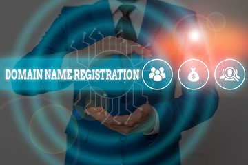 Handwriting text writing Domain Name Registration. Conceptual photo Own an IP Address Identify a particular Webpage Male human wear formal work suit presenting presentation using smart device