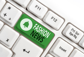 Conceptual hand writing showing Fashion News. Concept meaning the latest published article about customs and trends White pc keyboard with note paper above the white background