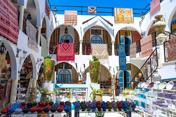 Tunisia. (Southern Tunisia). Island of Djerba. Houmt Souk. Souvenir shop for tourists in the medina - obrazy, fototapety, plakaty