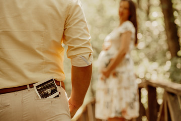 Romantic moments for pregnant couple